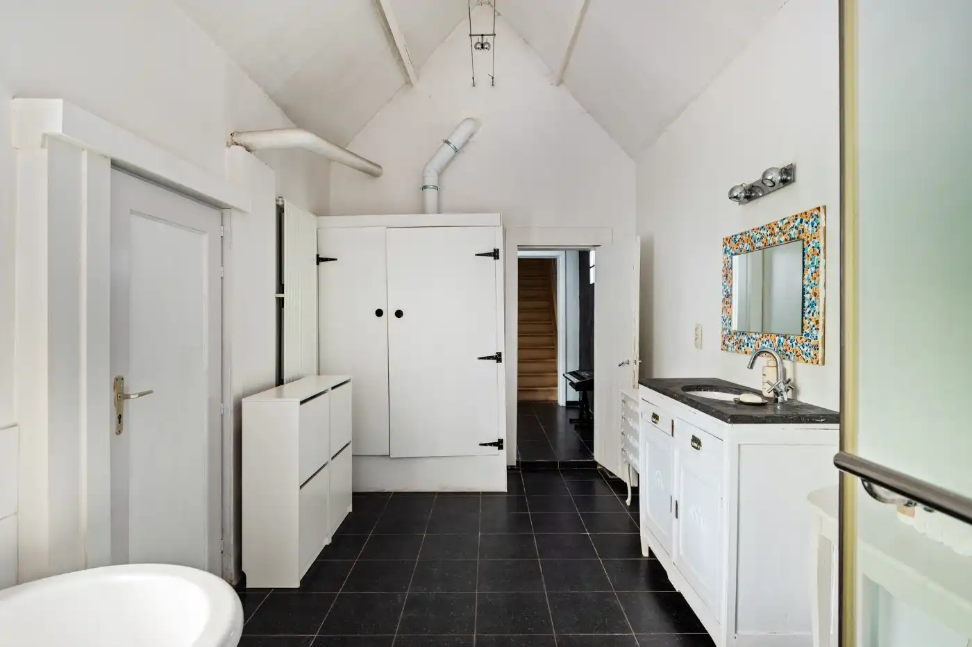 Charmante, top gelegen woning met 2 slpk. en fantastische zuid-tuin foto 14