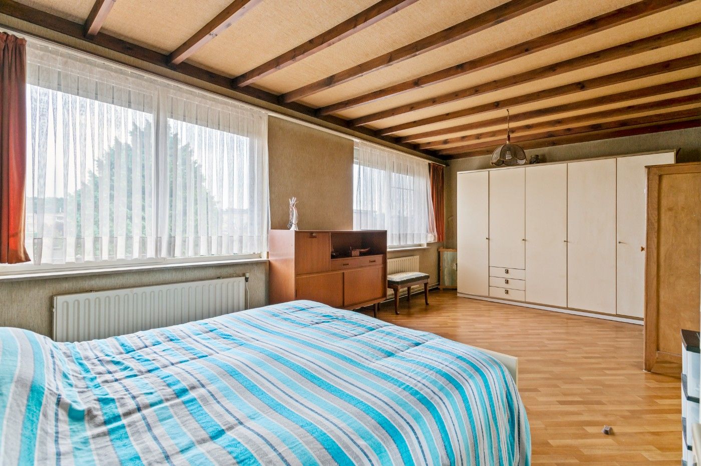 Op te frissen woning met 4 à 5 slpk., inpandige garage en zuidwest-tuin foto 14