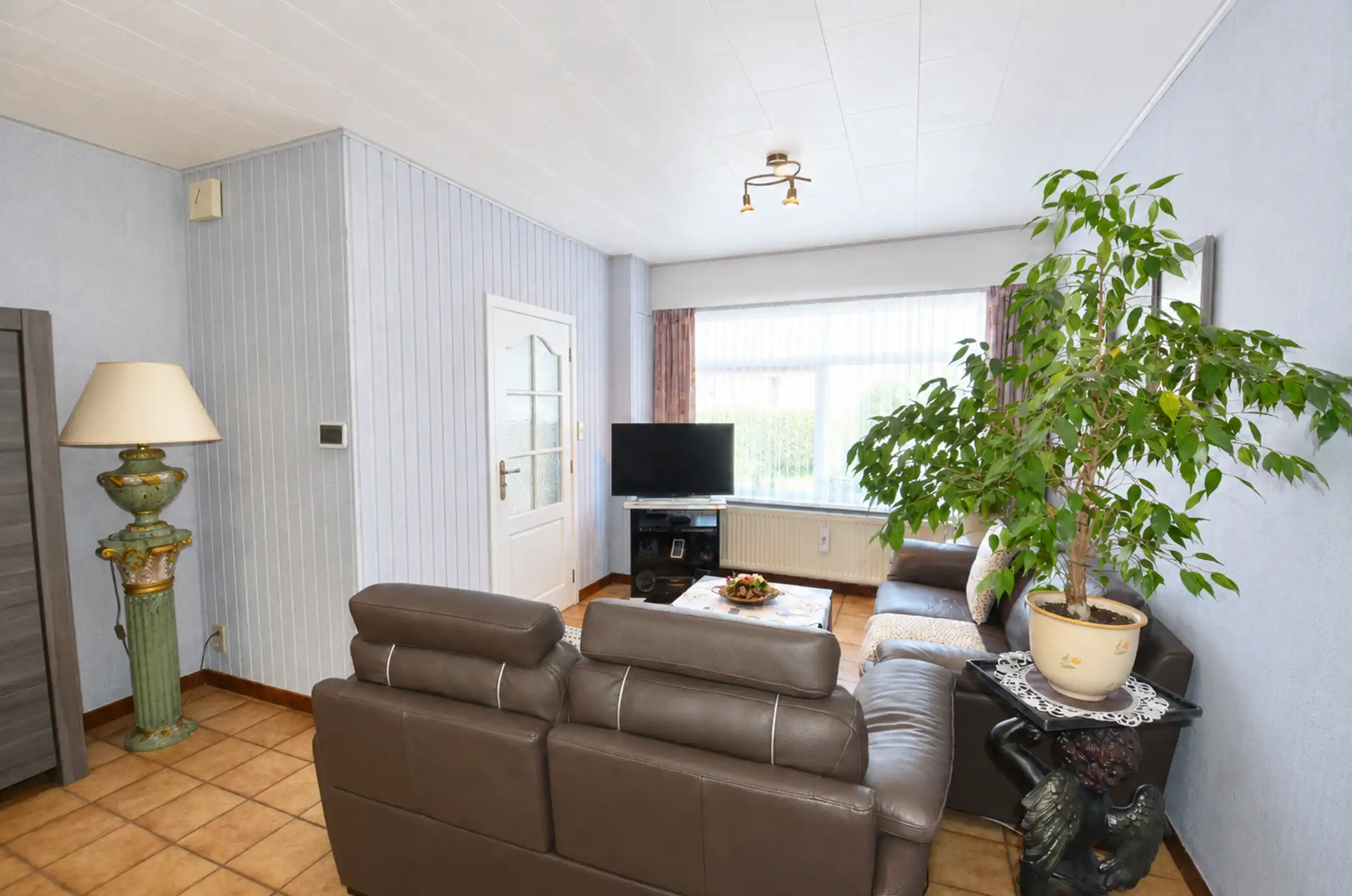 Charmante stadswoning met 2 slaapkamers en een gezellig tuintje foto 2