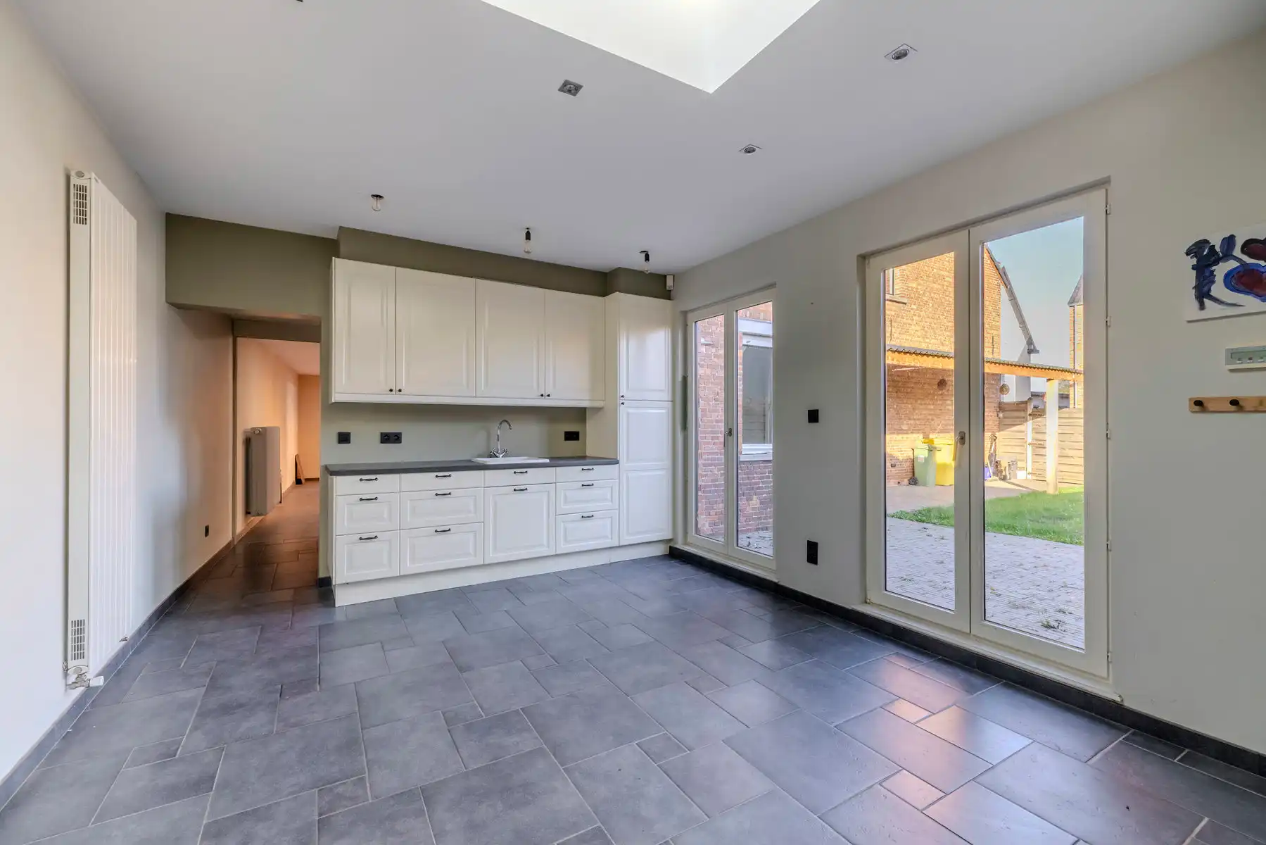 Charmante woning met 2 slpk + polyvalente ruimte en tuin foto 16