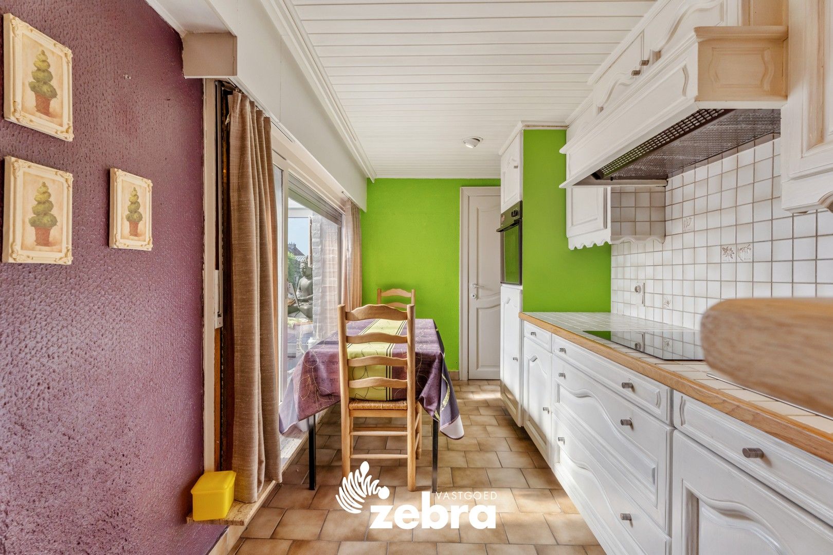 Op te frissen woning met zuidwestgerichte tuin en uitweg op een centrale ligging te Tielt! foto 9