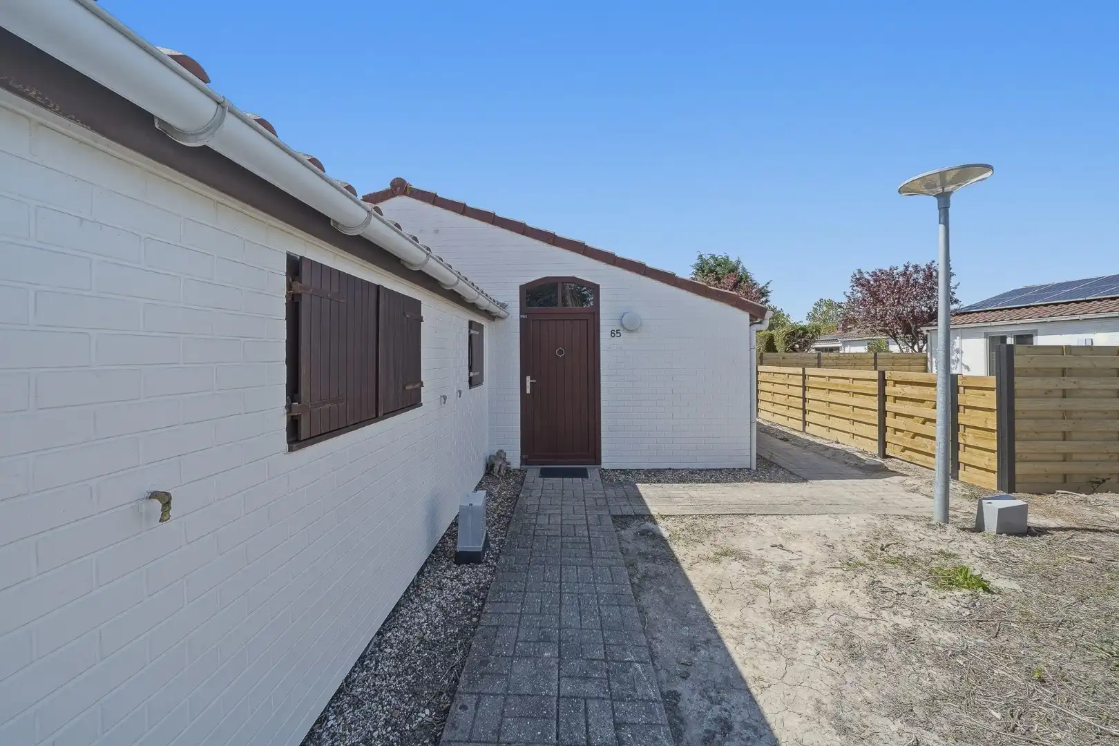 Instapklare vakantiewoning met zonnige tuin en 2 slaapkamers foto 13