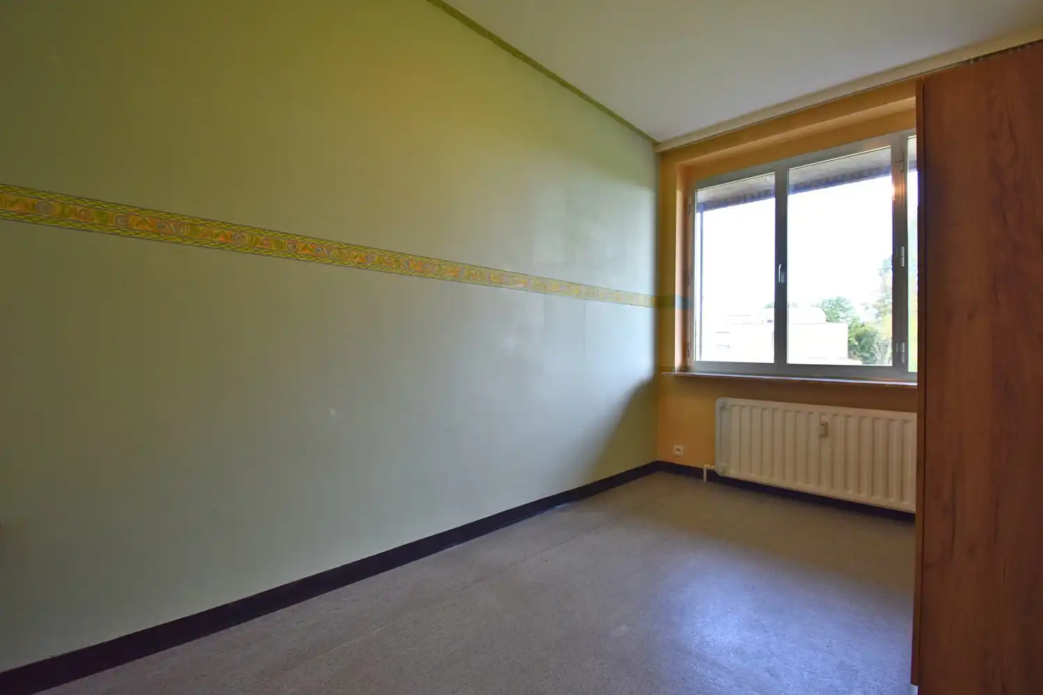 Ruim 2-kamer appartement met terras en autostaanplaats foto 6