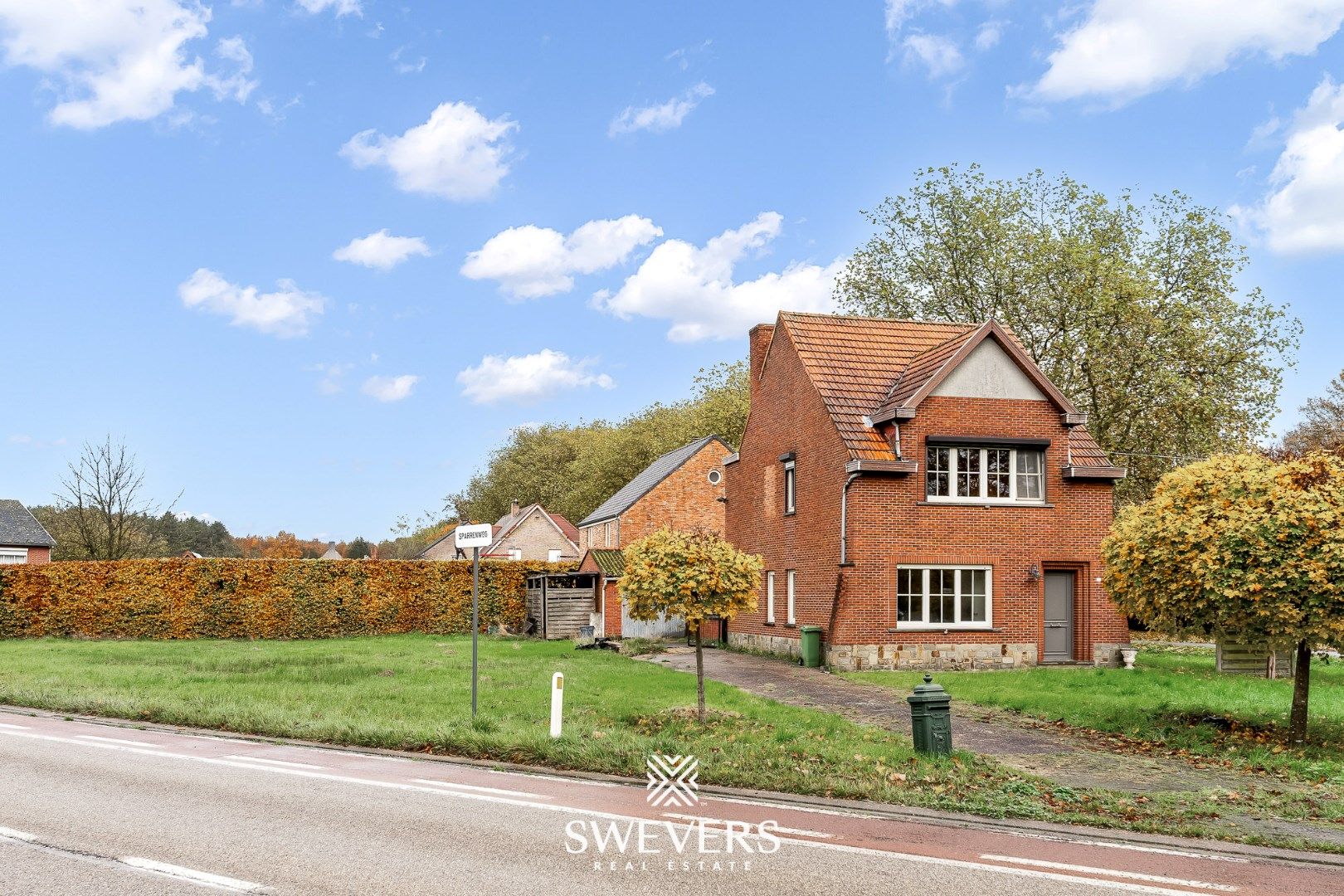 Deels gerenoveerde woning op ruim hoekperceel in Tessenderlo foto 30