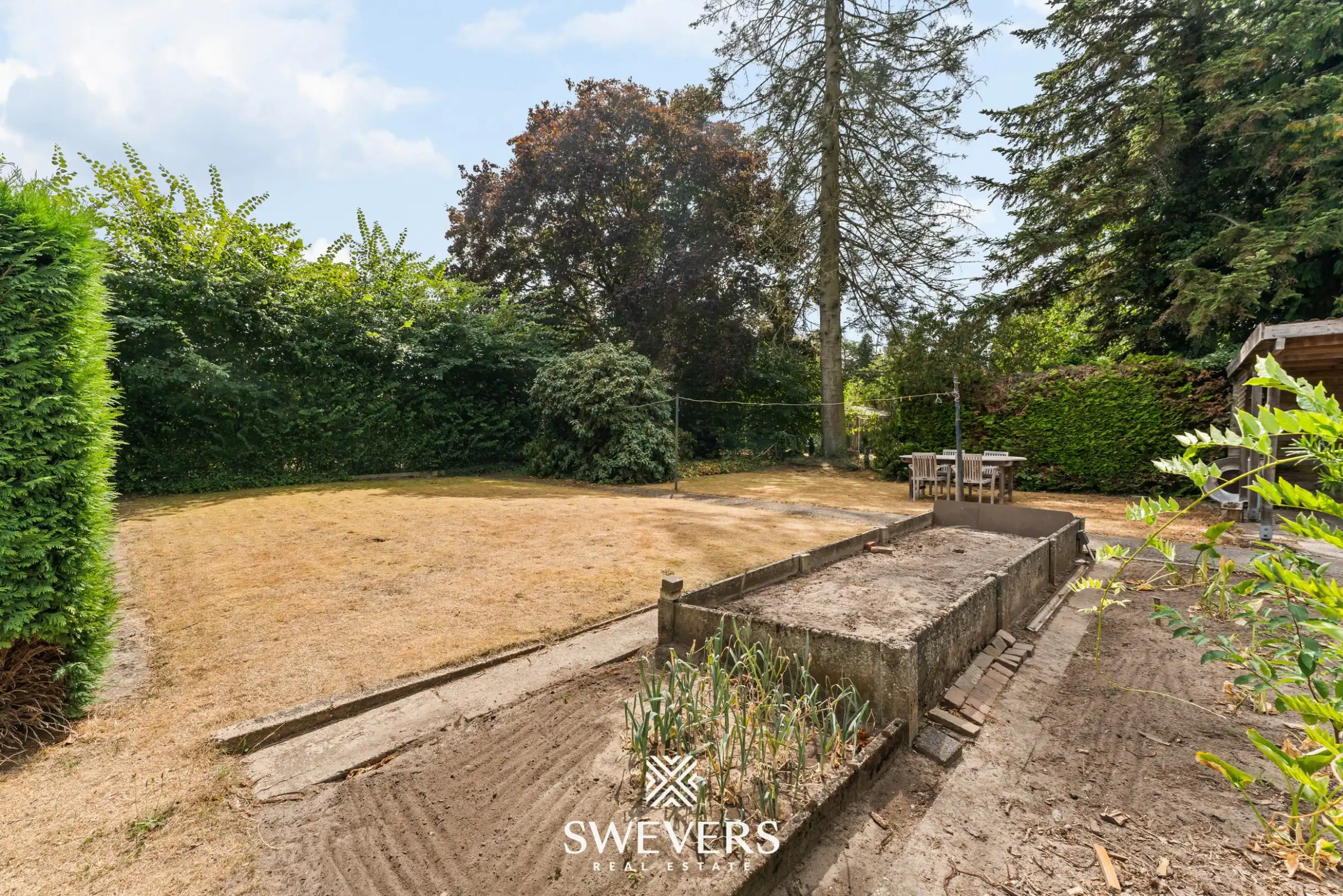 Uitstekend gelegen woning met 4 slaapkamers en mooie tuin foto 31