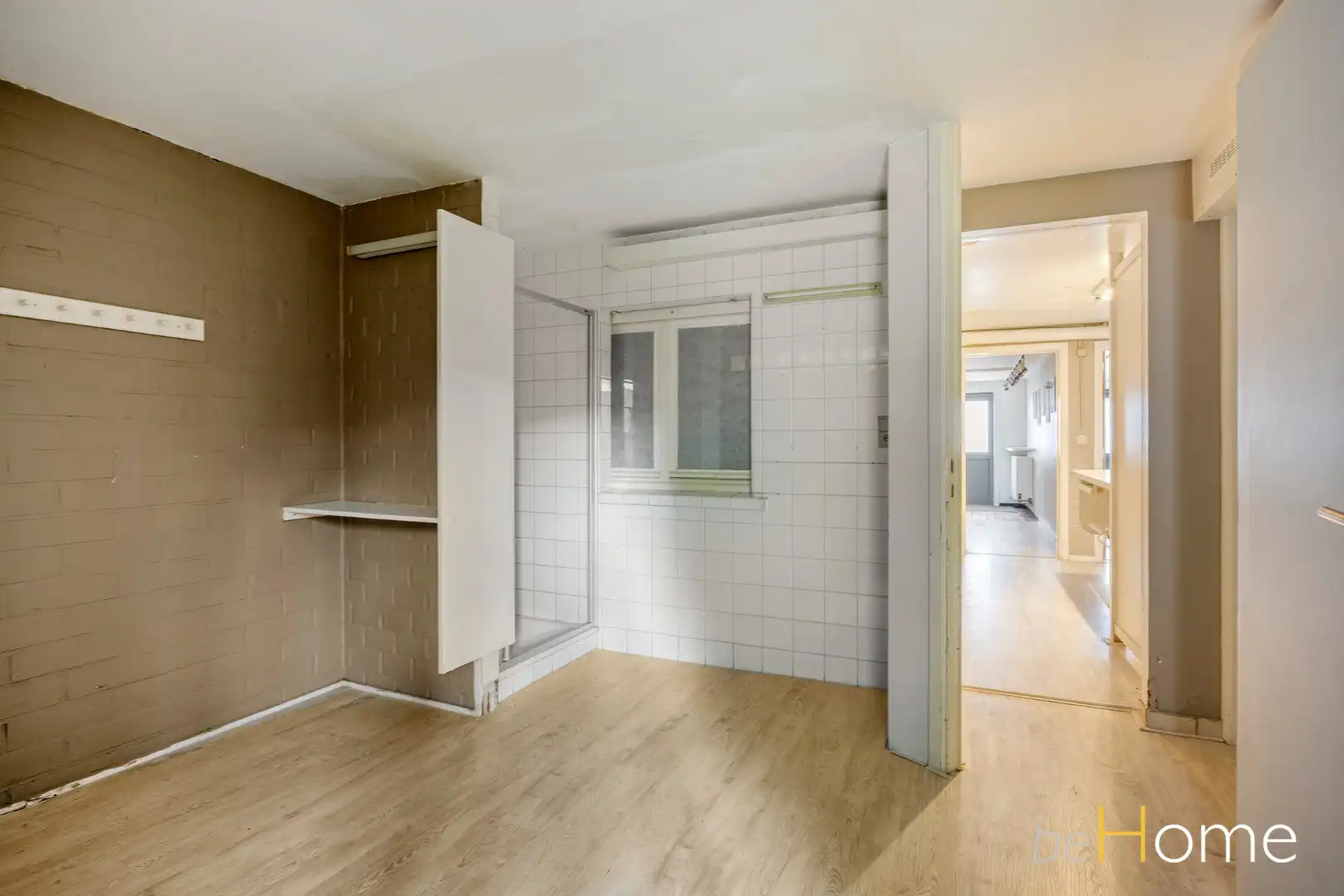 TE KOOP - Ruime 2-gevelwoning met praktijkruimte en uitzonderlijk potentieel in het hart van Merchtem foto 11