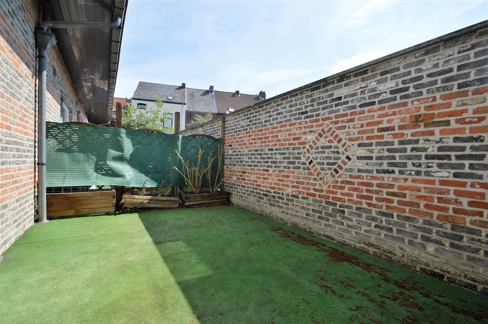 Sympathieke woning in een oase van rust middenin centrum  foto 8