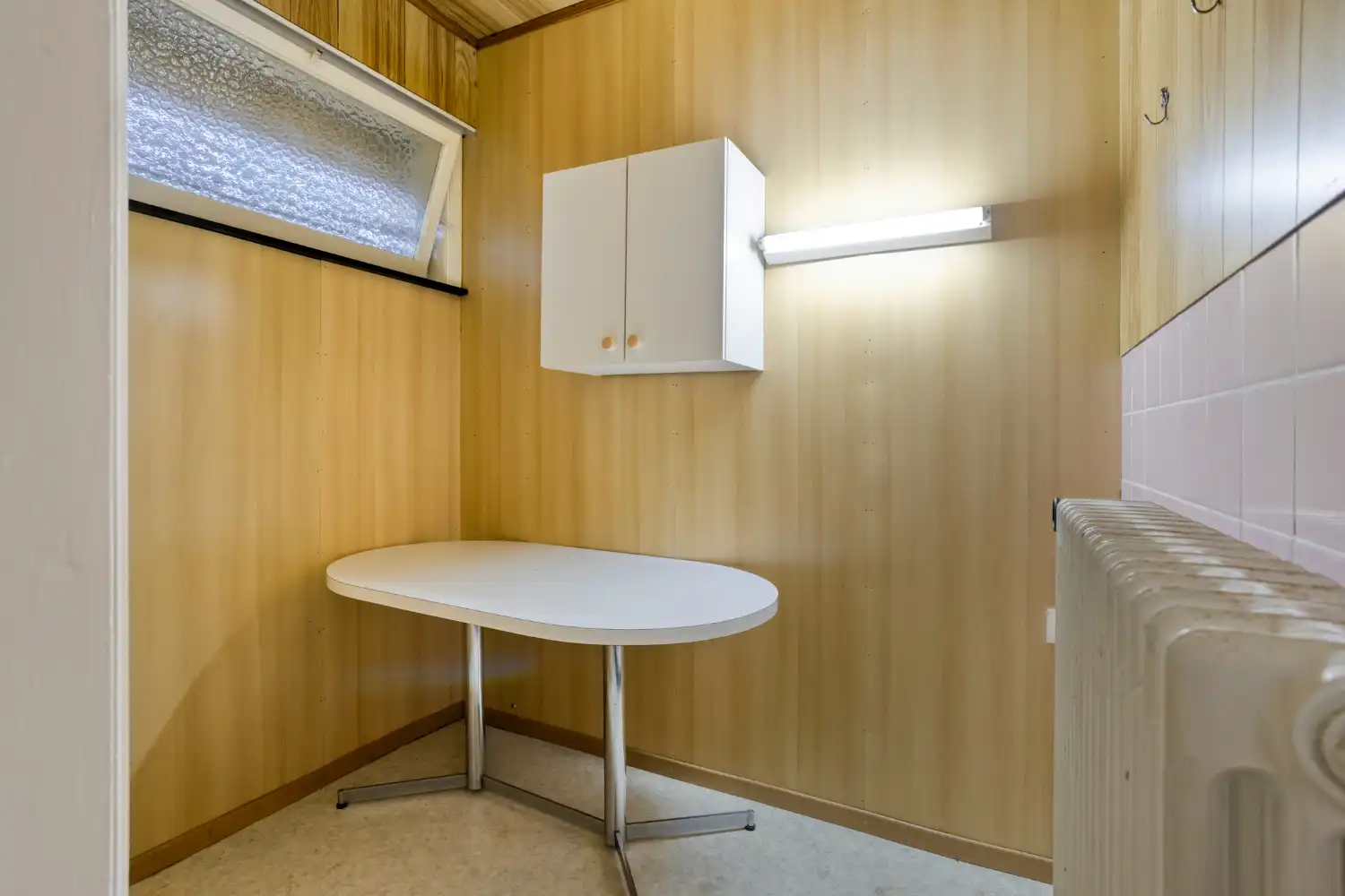 Verzorgde bungalow op topligging met 2 slaapkamers, inpandige garage en zonnige tuin foto 12