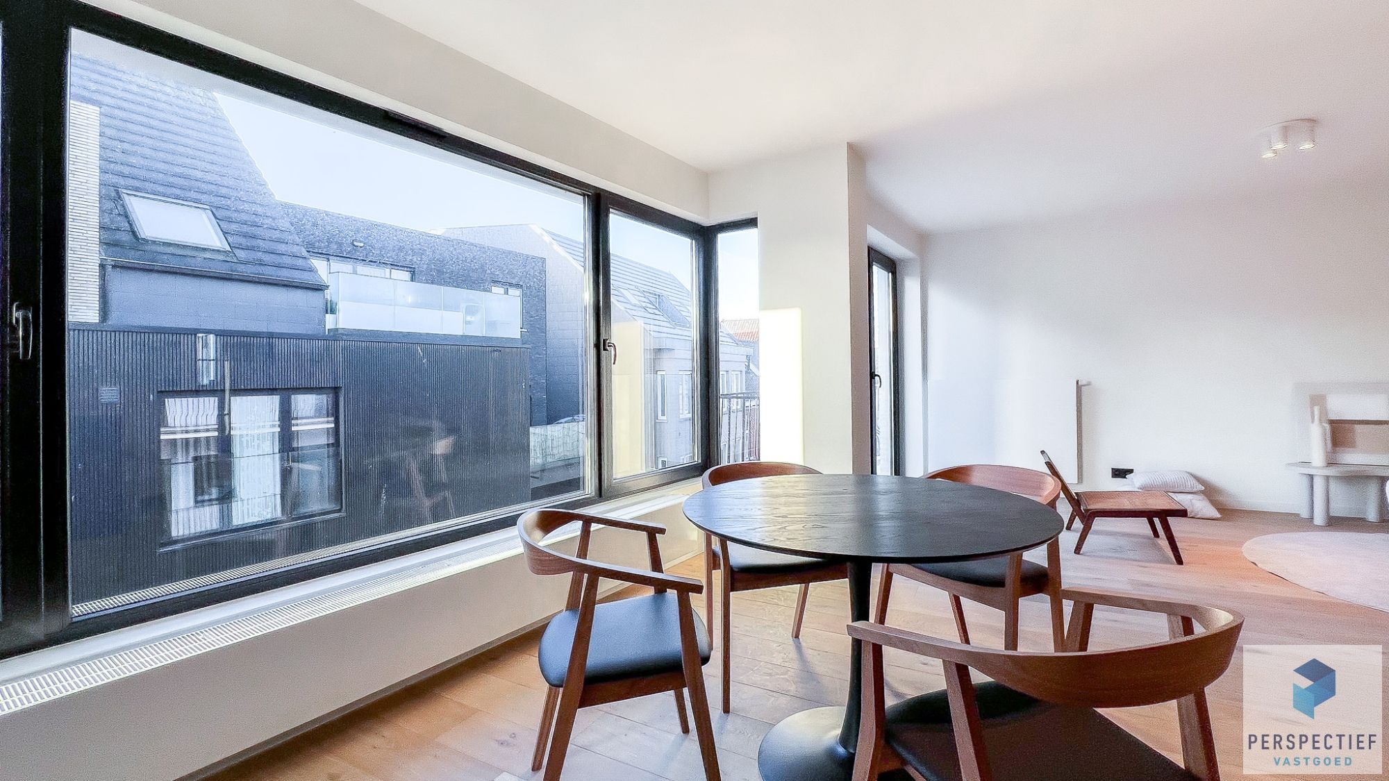 Vernieuwd ruim appartement (114m²) met 2 slaapkamers en terras aan de markt van Oedelem. foto 9