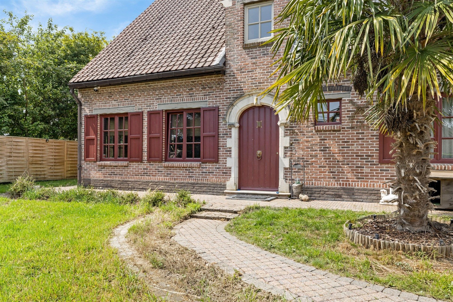 Ruim opgezette, landelijke woning met aangename tuin, 6 slaapkamers en een ingerichte woonstudio op de 2e verdieping foto 4