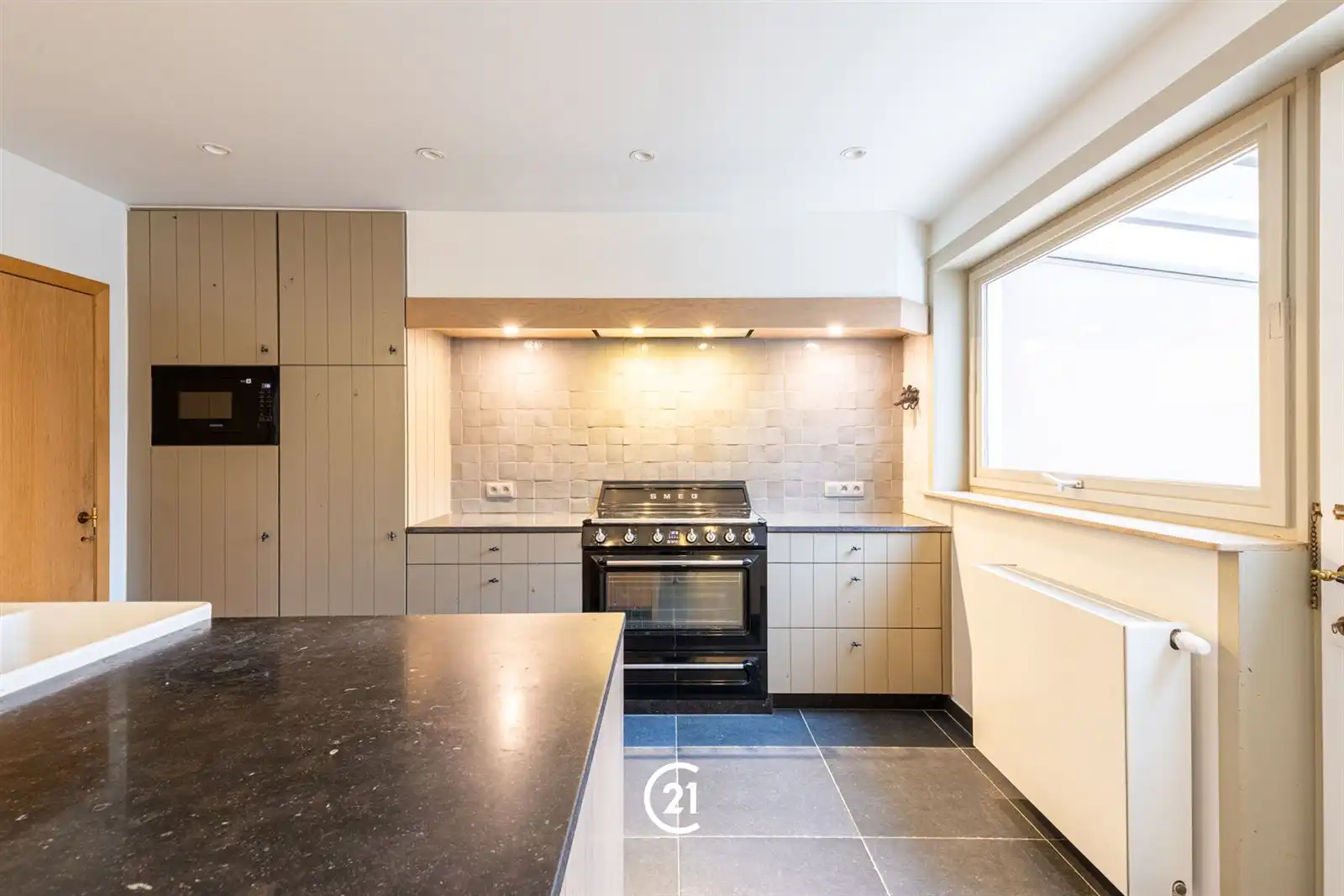 Halfopen woning met 3 slaapkamers en ruime tuin in Voorde foto 4