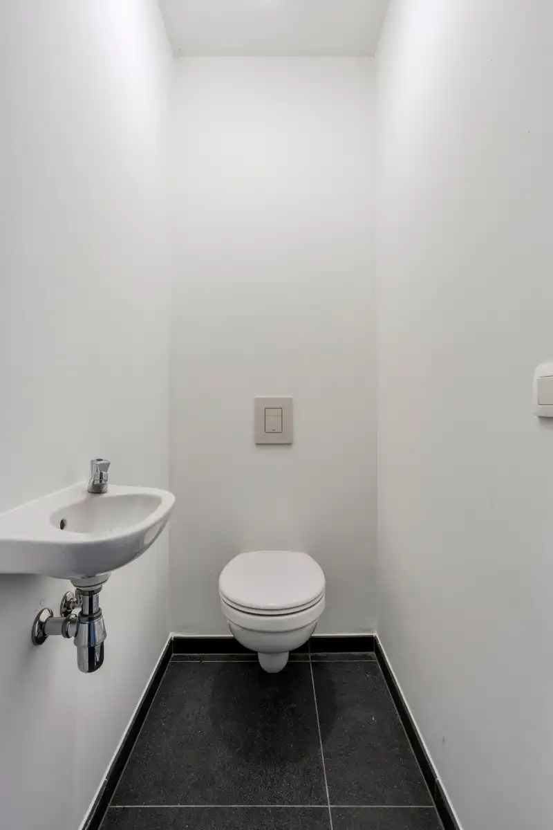 Leemans Immobiliën biedt u dit energiezuinige appartement aan met een adembenemend uitzicht over Brussel. foto 17