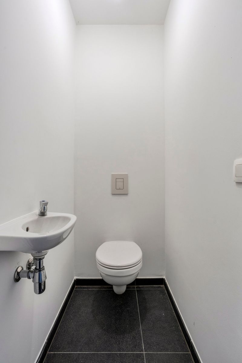 Leemans Immobiliën biedt u dit energiezuinige appartement aan met een adembenemend uitzicht over Brussel. foto 17