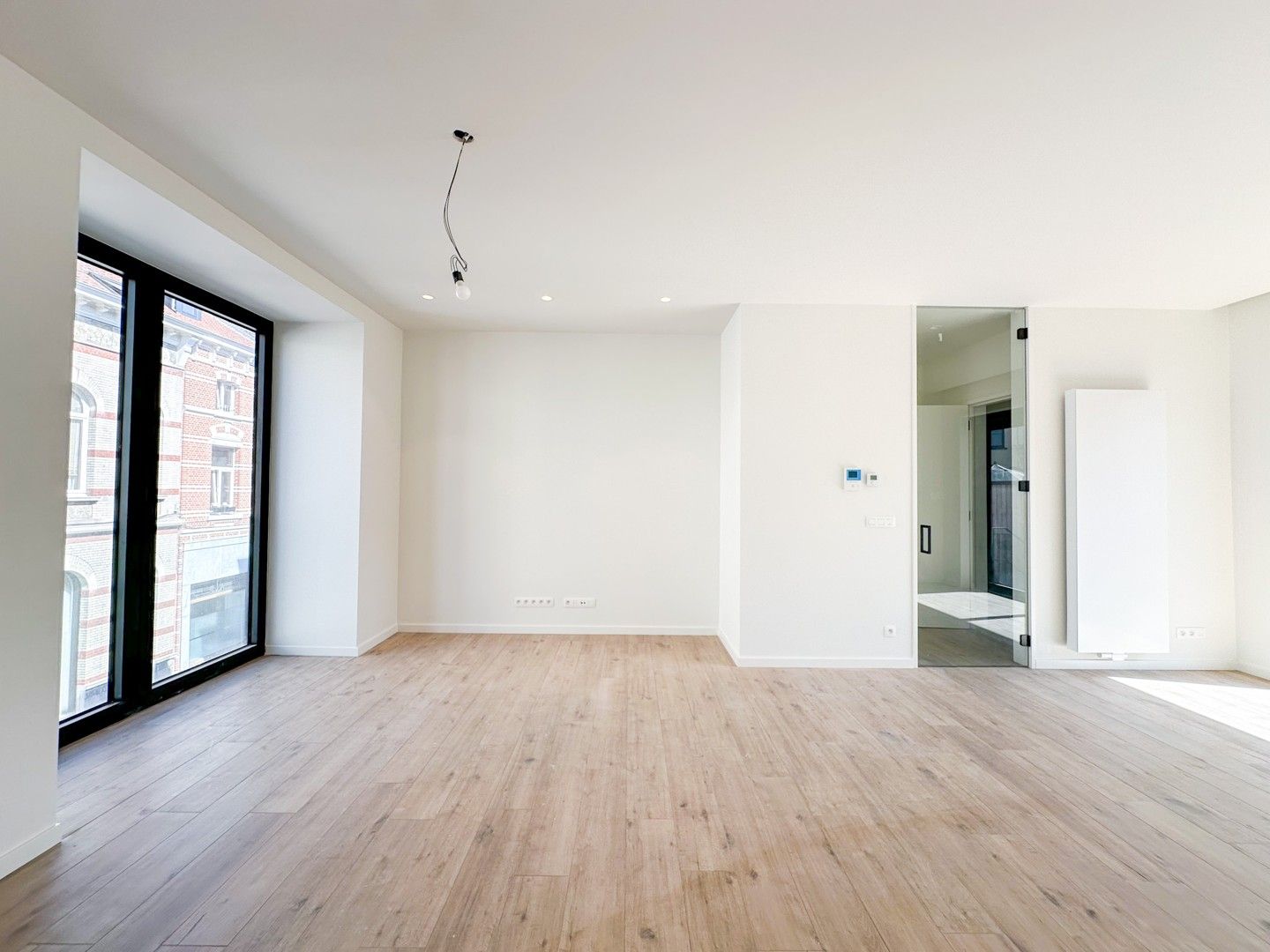 Uniek 2 slaapkamer nieuwbouwappartement te huur in het centrum van Sint-Niklaas foto 4