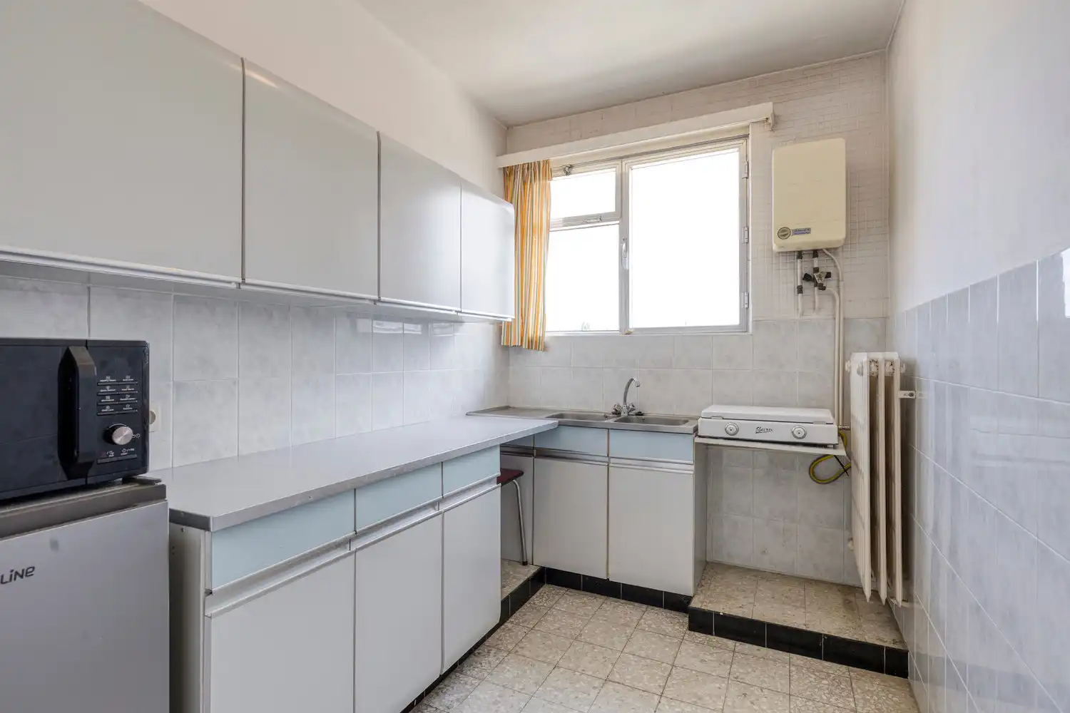 Vlakbij het Boekenberg Park en Rivierenhof gelegen te renoveren appartement met 2 slks. foto 12
