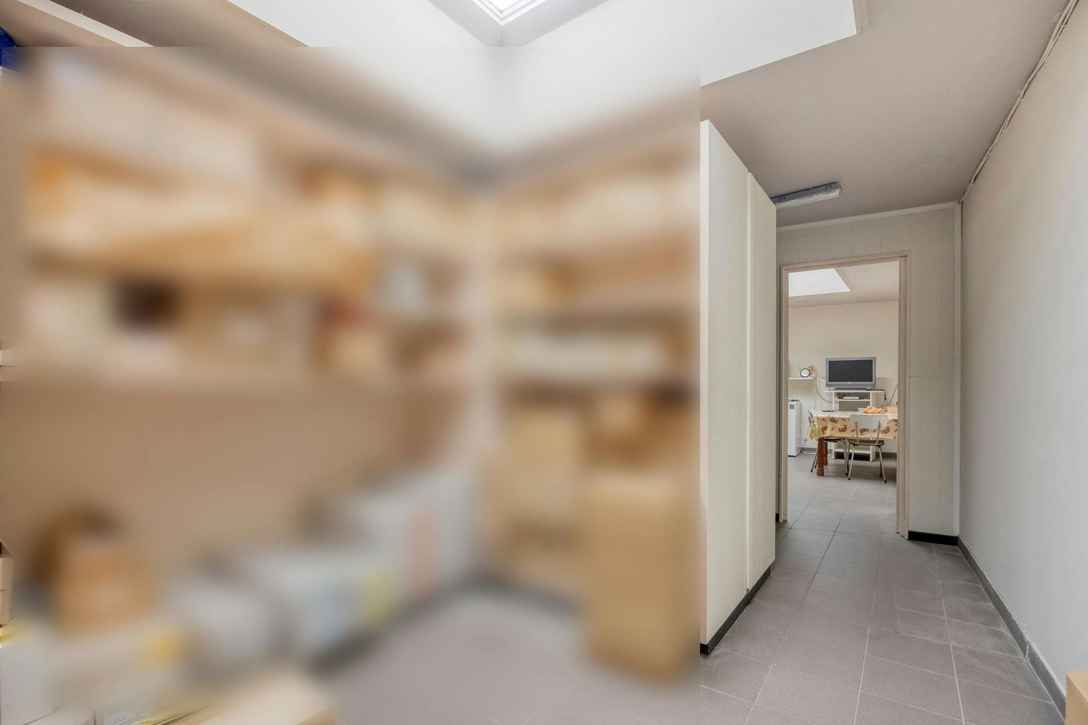 Opbrengsteigendom te koop in centrum van Eeklo foto 29