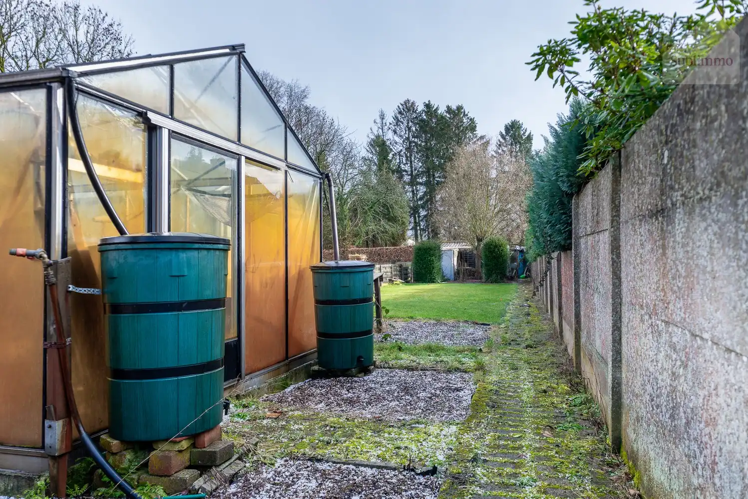 Opbrengsteigendom met 2 appartementen, tuin en garages te koop in Mol centrum foto 39