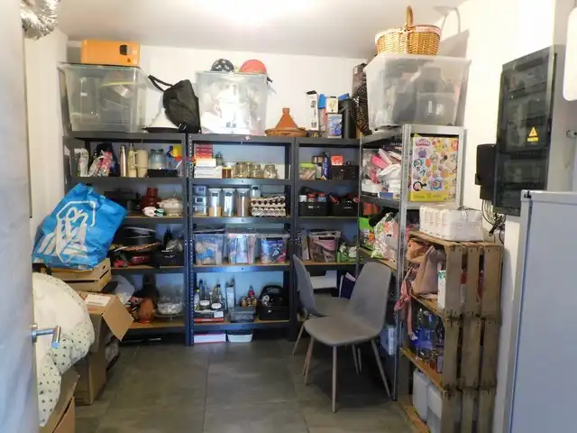 Rustig gelegen gezinswoning met 3 slpks, tuin en carport foto 17