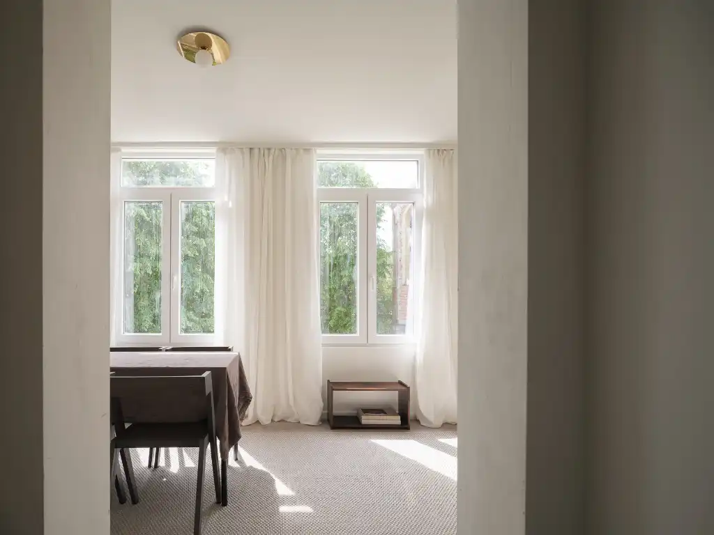 Uniek handelshuis met centrale ligging, bestaande uit een polyvalente kantoorruimte en een bovengelegen duplexappartement. foto 14