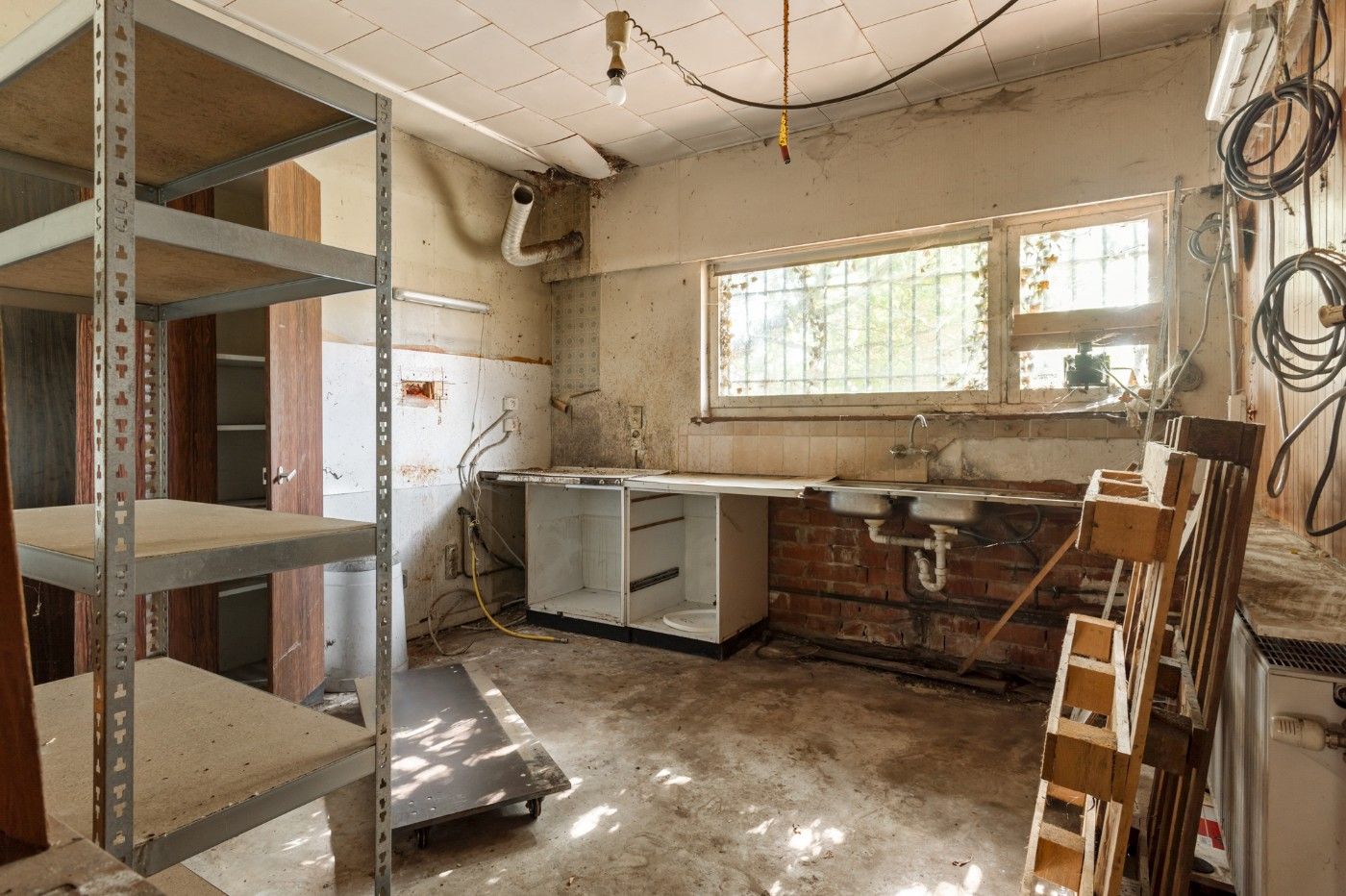 Te renoveren woning met 2 slpk., garage en grote tuin foto 7