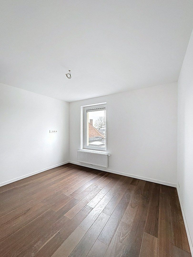 Elegant wonen in Tienen: gerenoveerde rijwoning met 3 slaapkamers en zuidwestgerichte tuin. foto 11