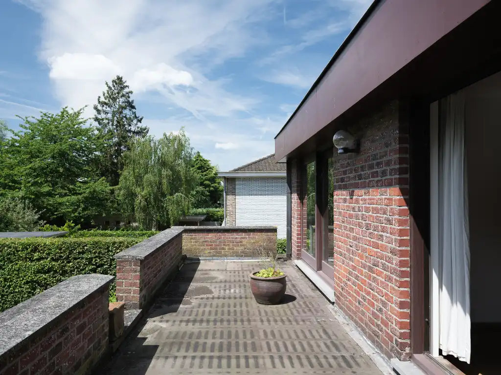 Halfopen bebouwing op een zuidgericht perceel, gelegen nabij station Gent-Sint-Pieters. foto 14