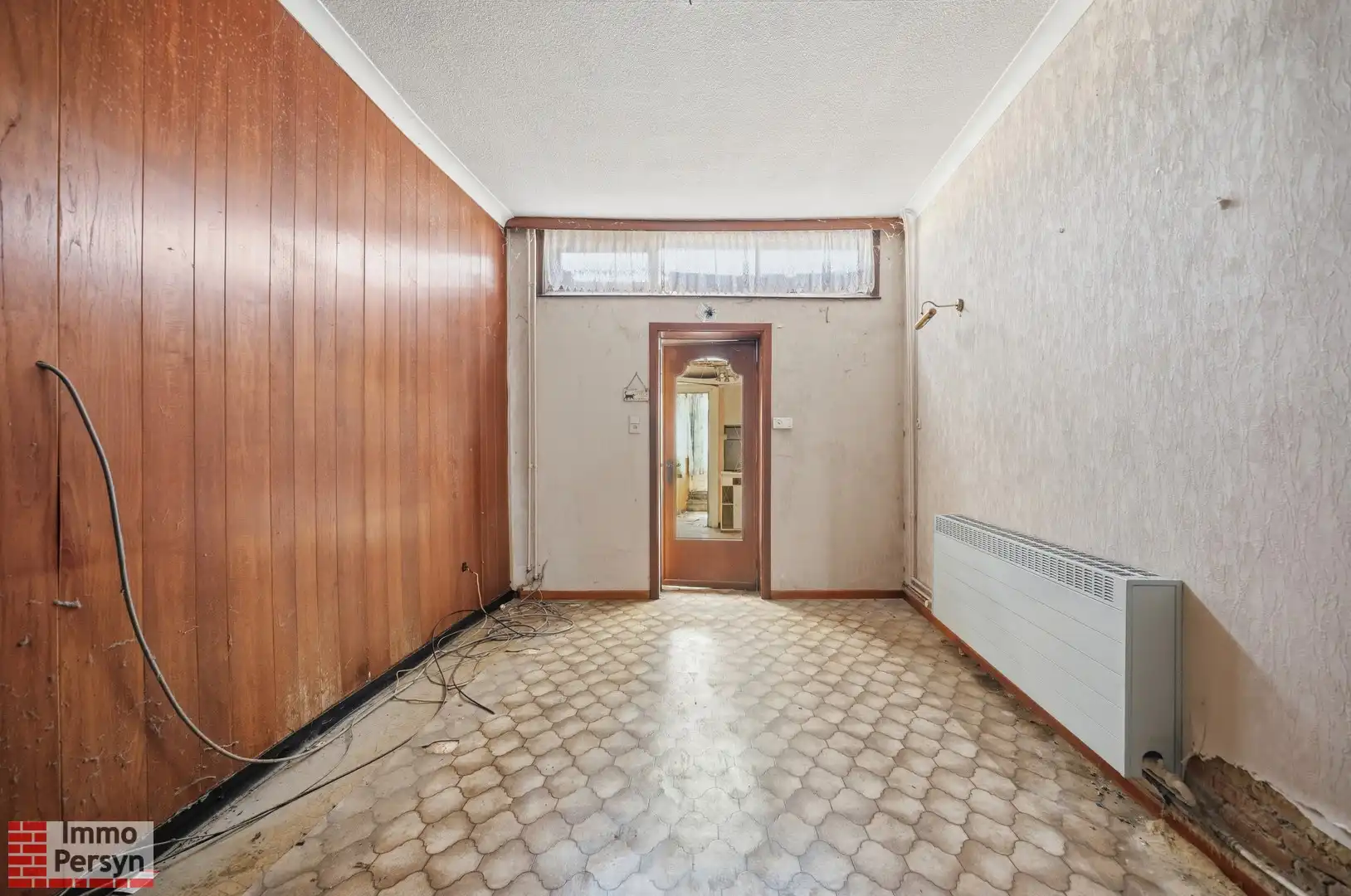 Te renoveren rijwoning met tuin in hartje Zichem foto 4