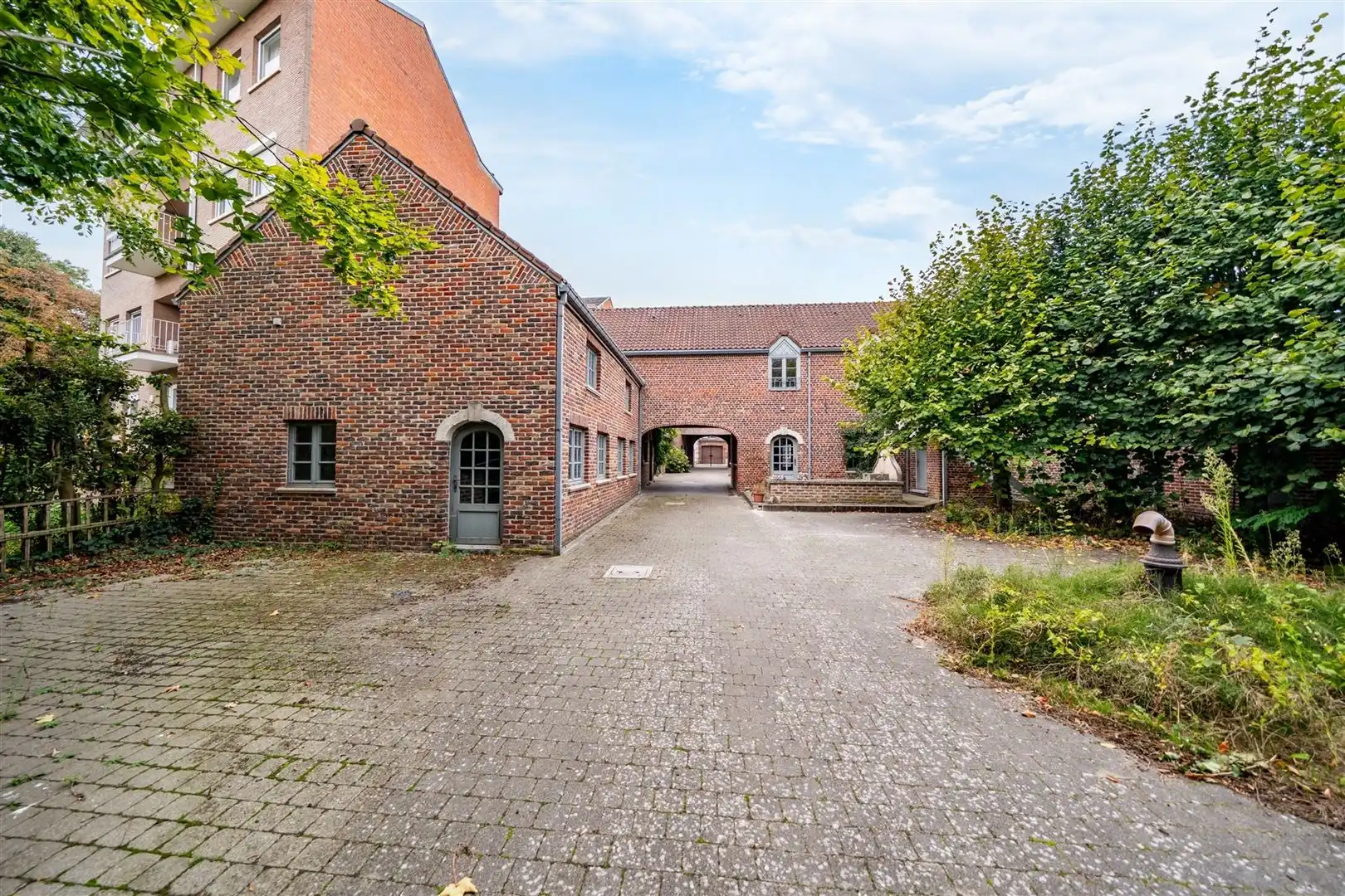 Handelscomplex met appartement in centrum Landen foto 33