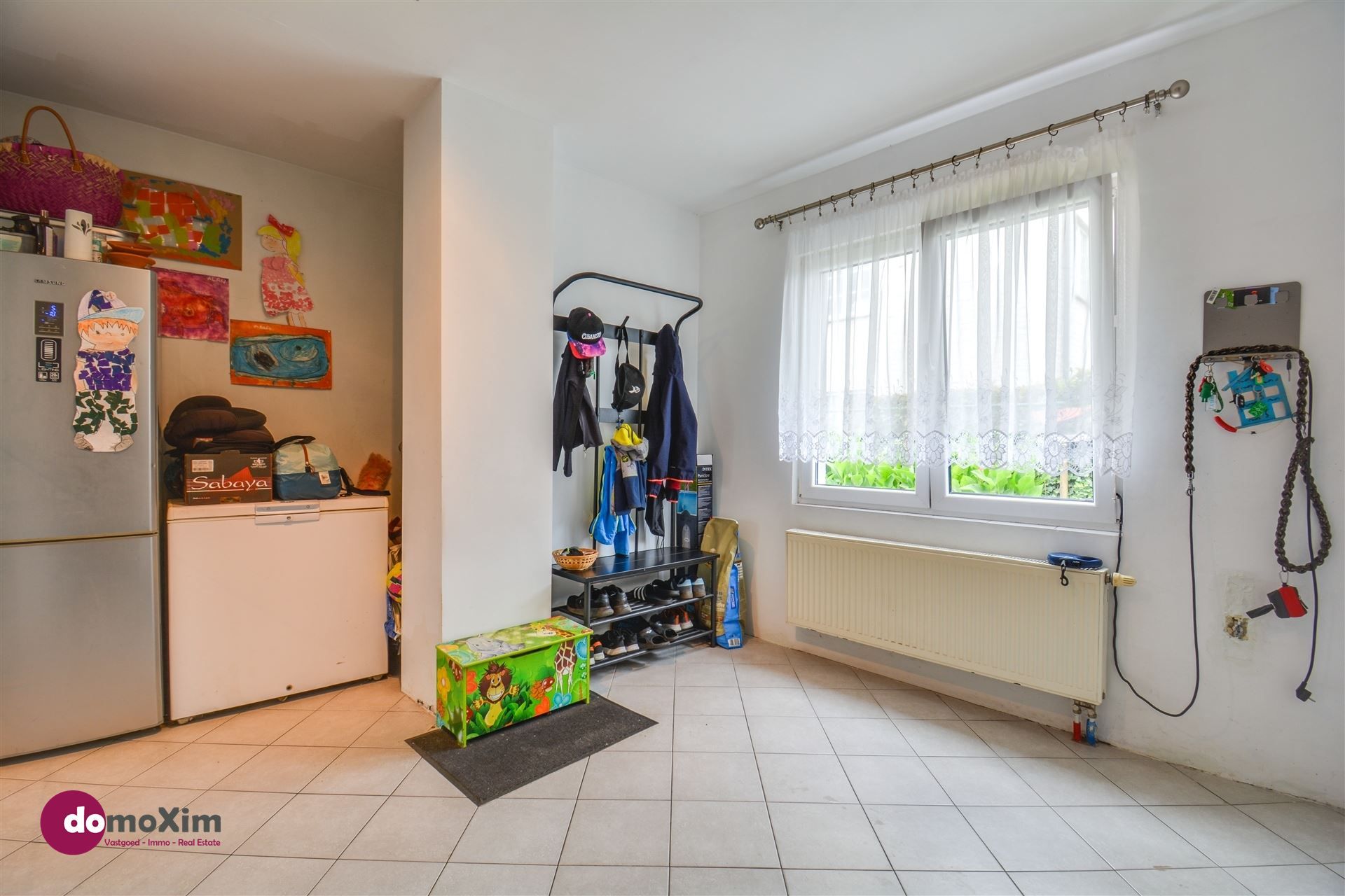 Centraal gelegen woning met 4 slaapkamers en grote tuin foto 7