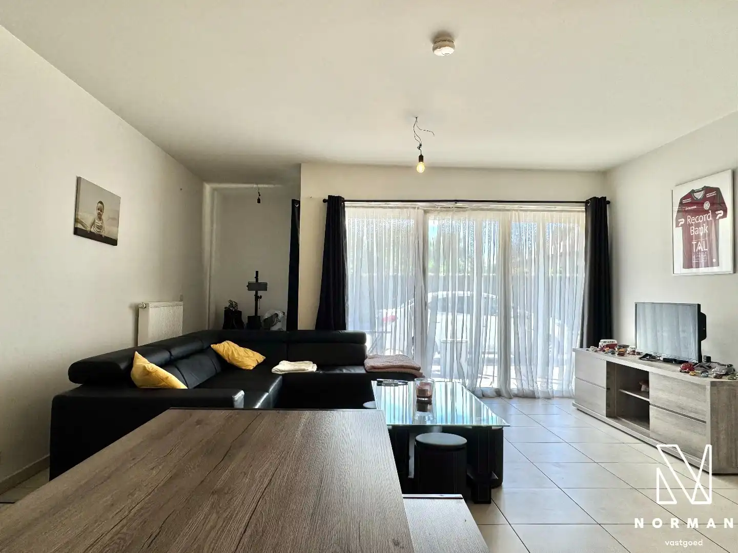 Gelijkvloers, instapklaar 2-slaapkamer appartement te koop met terras in centrum Bavikhove! foto 7