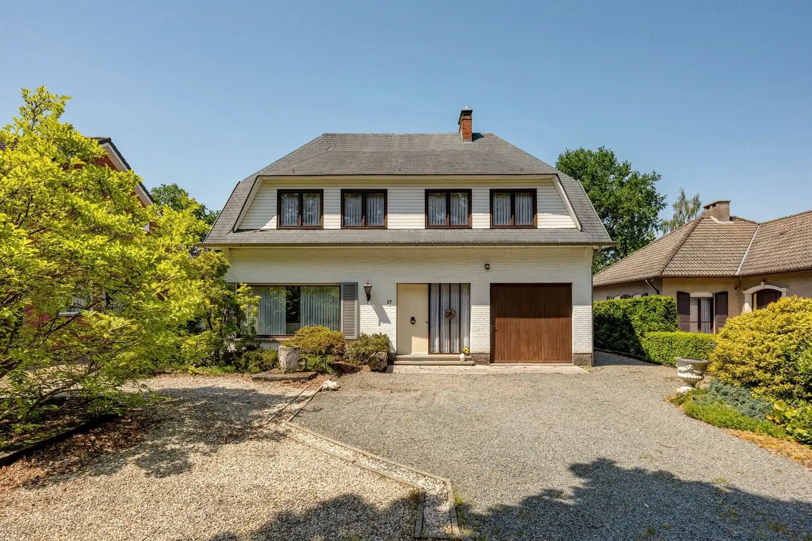 Hoofdfoto van de publicatie: Karaktervolle villa op prachtig perceel van 1.063 m² in residentieel Schoten