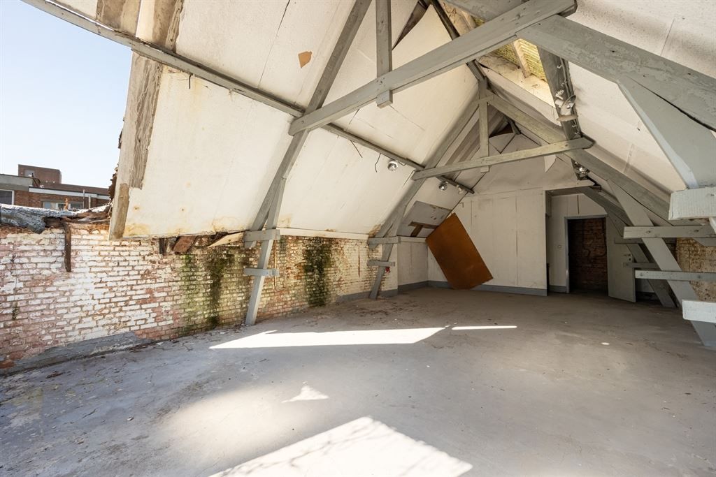 Woning met gigantisch magazijn te renoveren foto 34