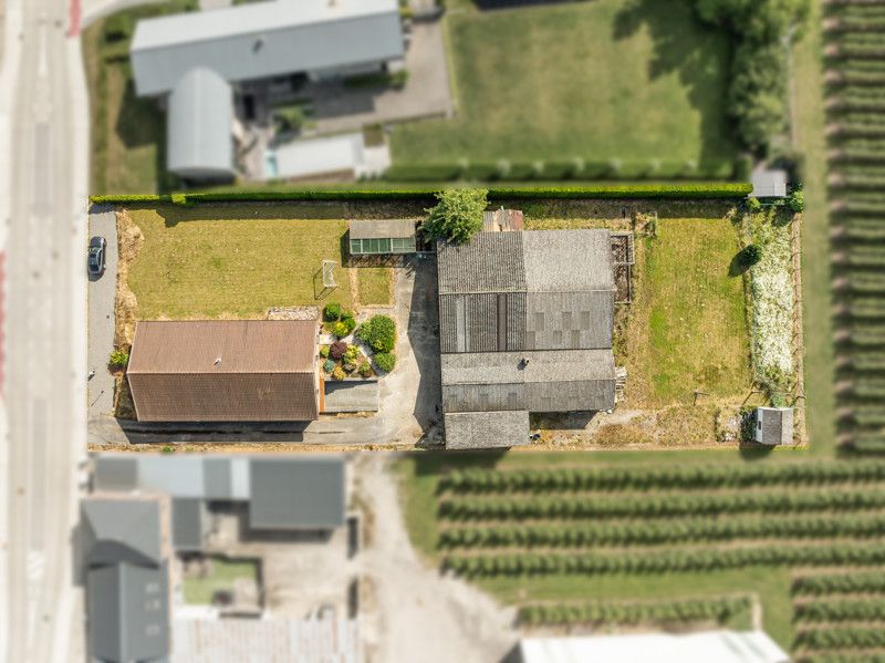 Gelijkvloerse woning met grote loods achteraan op 25are foto 20