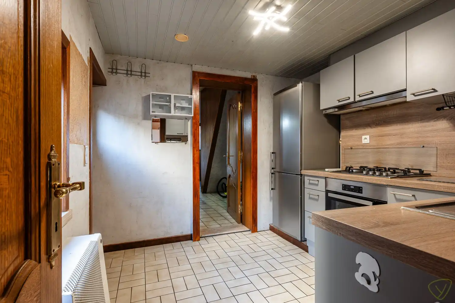 Charmante gesloten bebouwing met ruime tuin en renovatiepotentieel foto 8