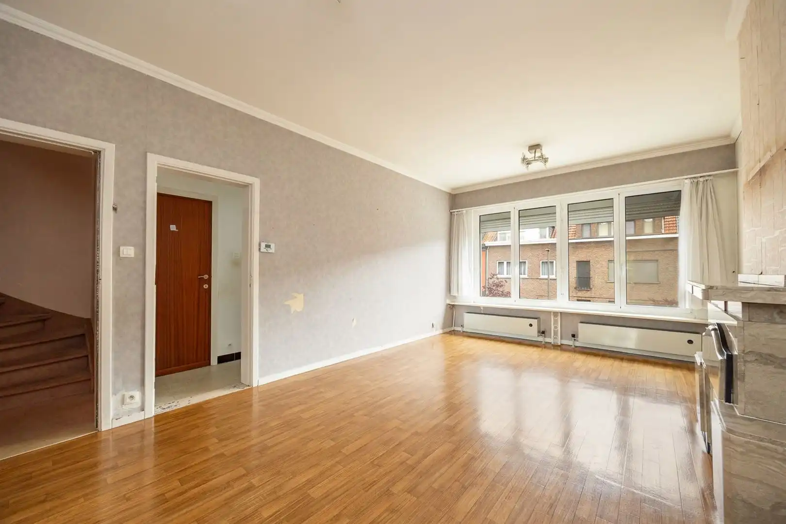 Ruime gezinswoning met zonnige tuin en renovatiepotentieel foto 14