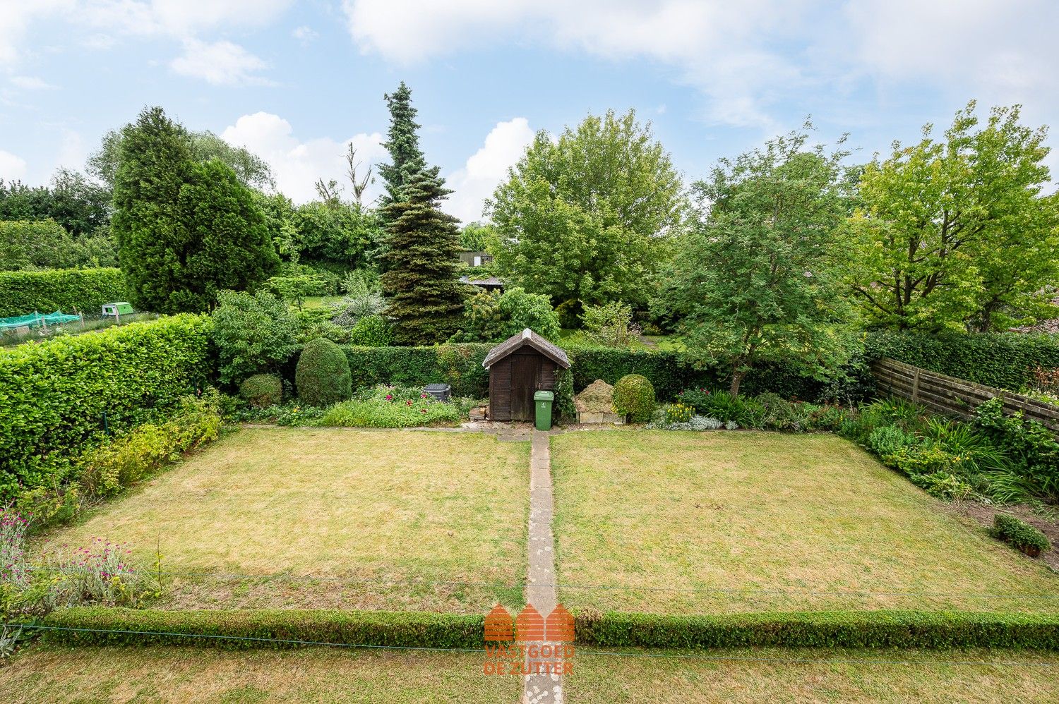 Ruime woning met potentieel en zuidgerichte tuin in doodlopende straat foto 9