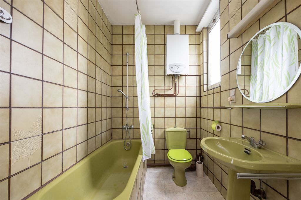 Zeer ruime, te renoveren woning met tuin foto 25