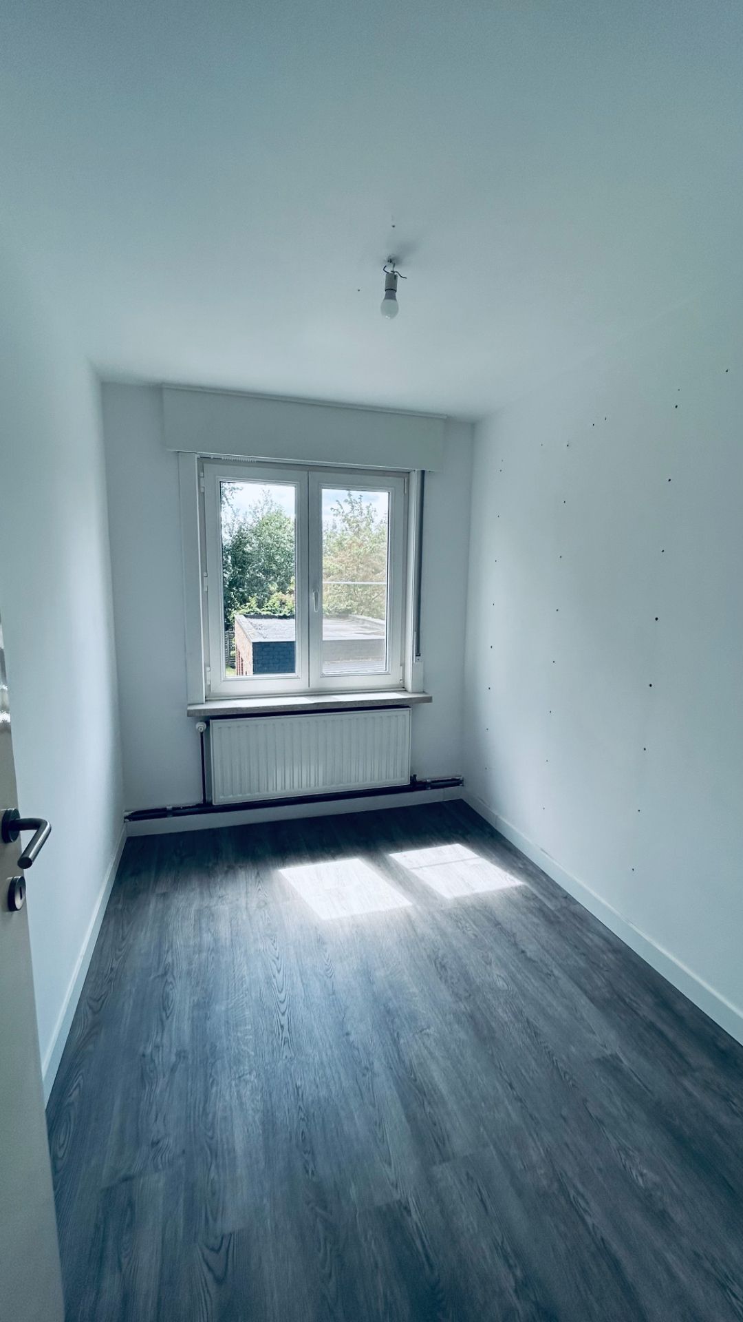 Centraal gelegen halfopen bebouwing met: oprit, tuin en garage foto 9