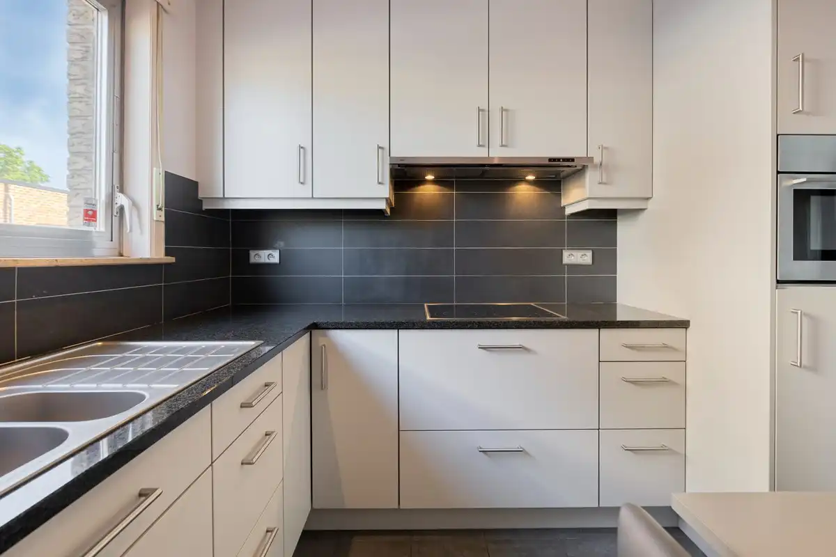 Gelijkvloers appartement met 2 slaapkamers, terras en tuin foto 11