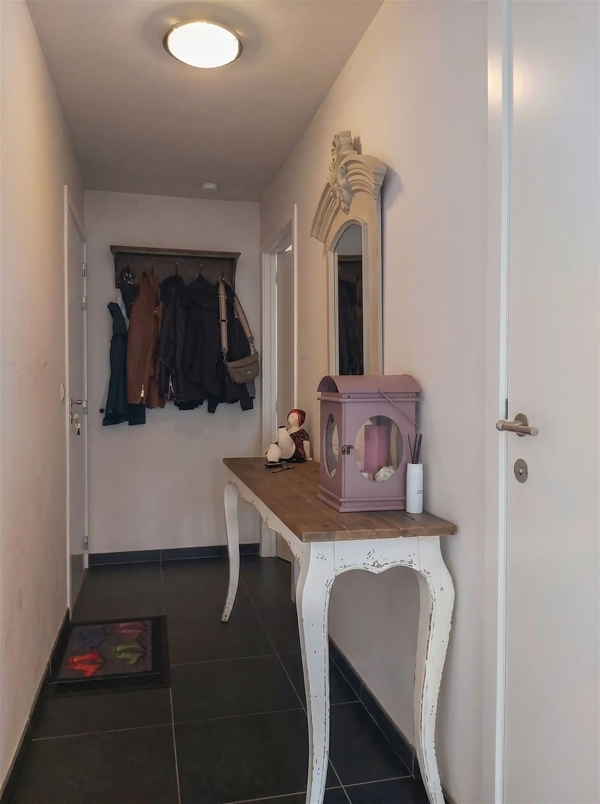 Instapklaar duplexappartement met inpandige garage, zuidgericht terras en 2 slaapkamers op mooie locatie in Maasmechelen! foto 7