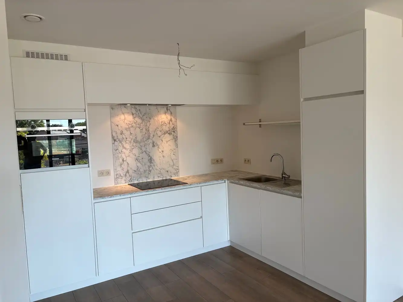 Mooi recent appartement met 2 slk, terras en ondergrondse parking met berging foto 6