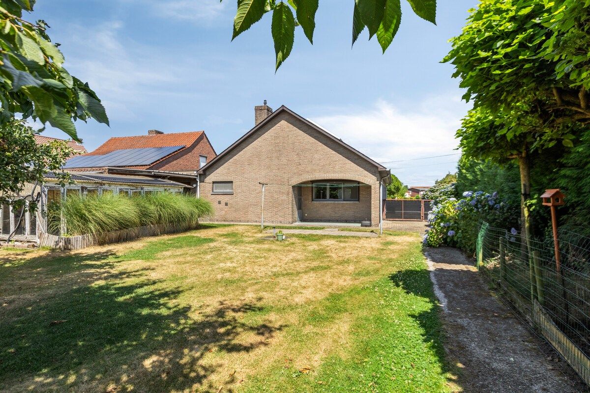 Rustig gelegen gelijkvloers woning met 2 slpks en ruime zolder. foto 17