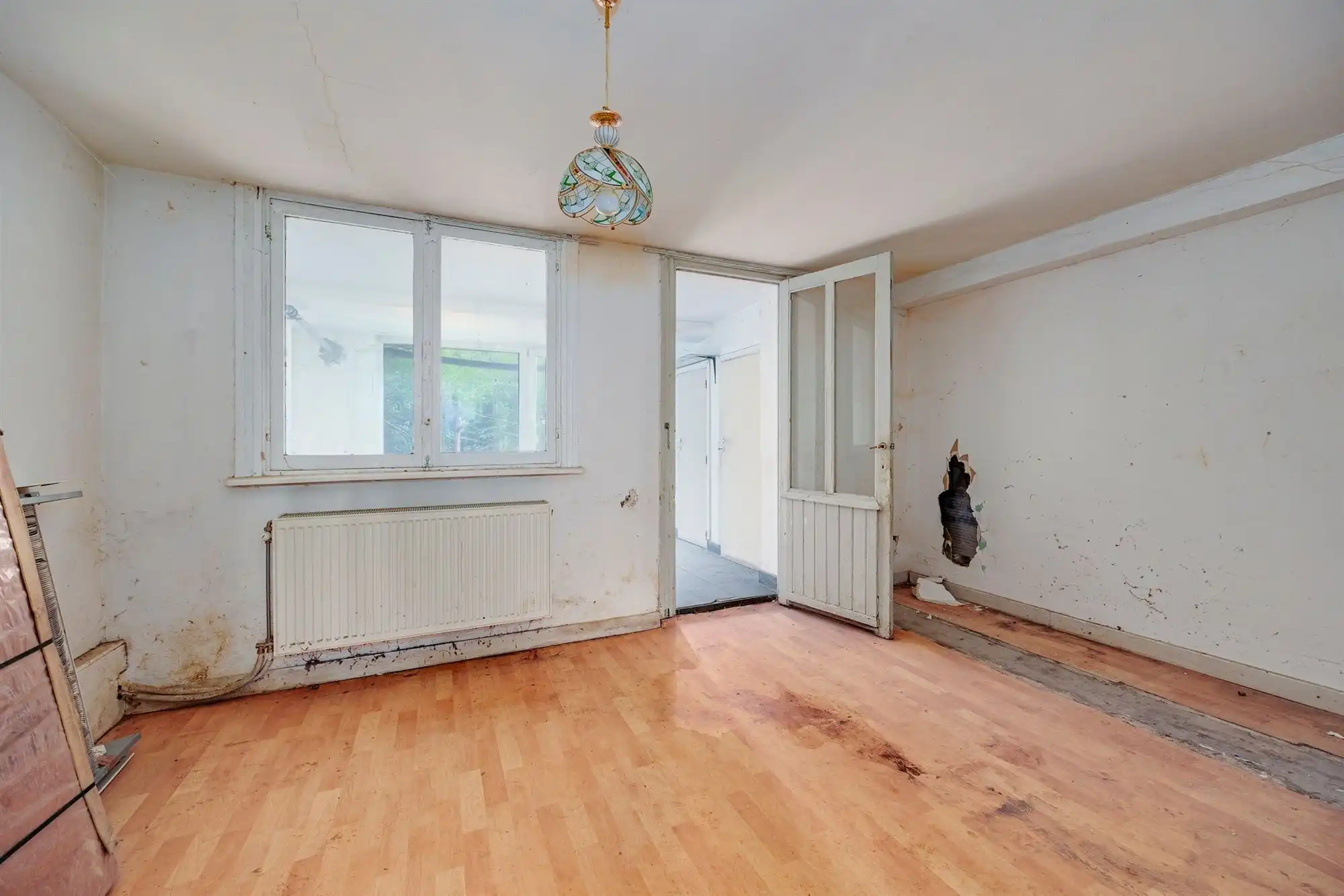 Volledig te renoveren huis met ruime tuin en tal van mogelijkheden! foto 8