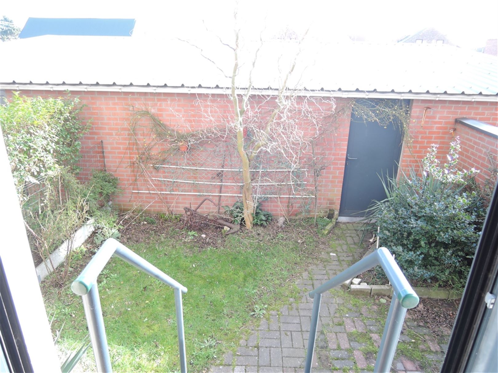 Gelijkvloers appartement met garage box foto 13