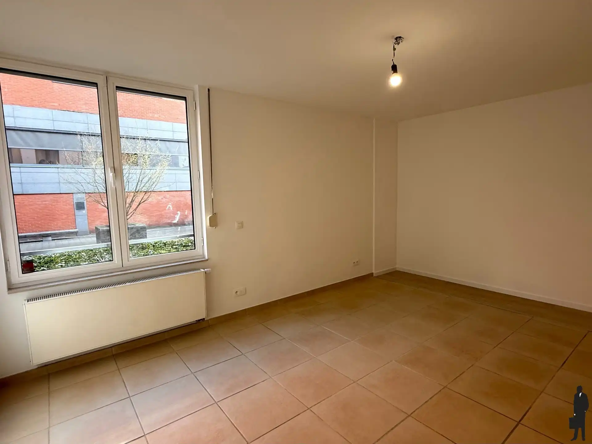 Lichtrijk gelijkvloers appartement met ruim terras foto 11