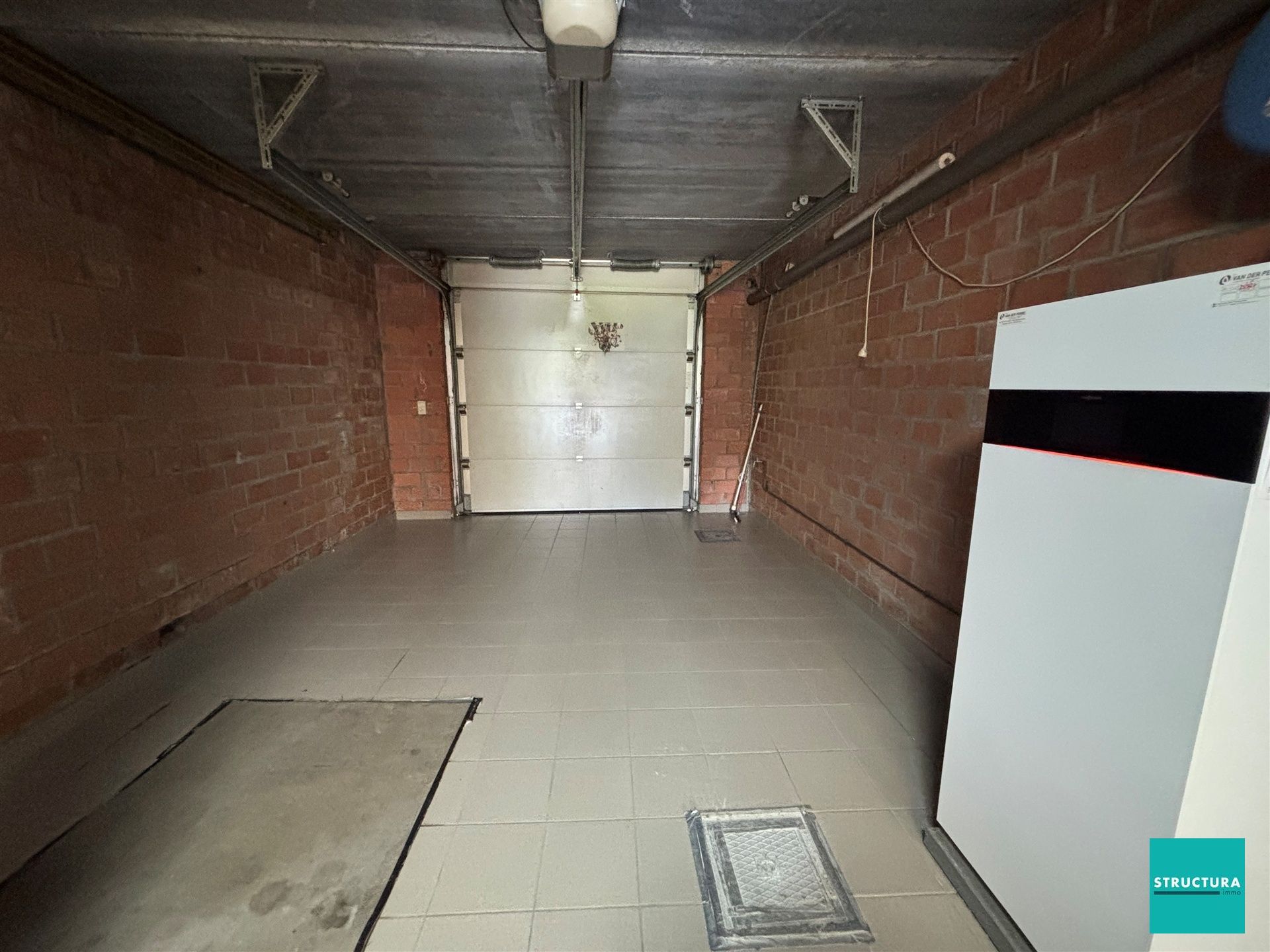 Appartement met 3 kamers en ruime garage in centrum Merchtem foto 17