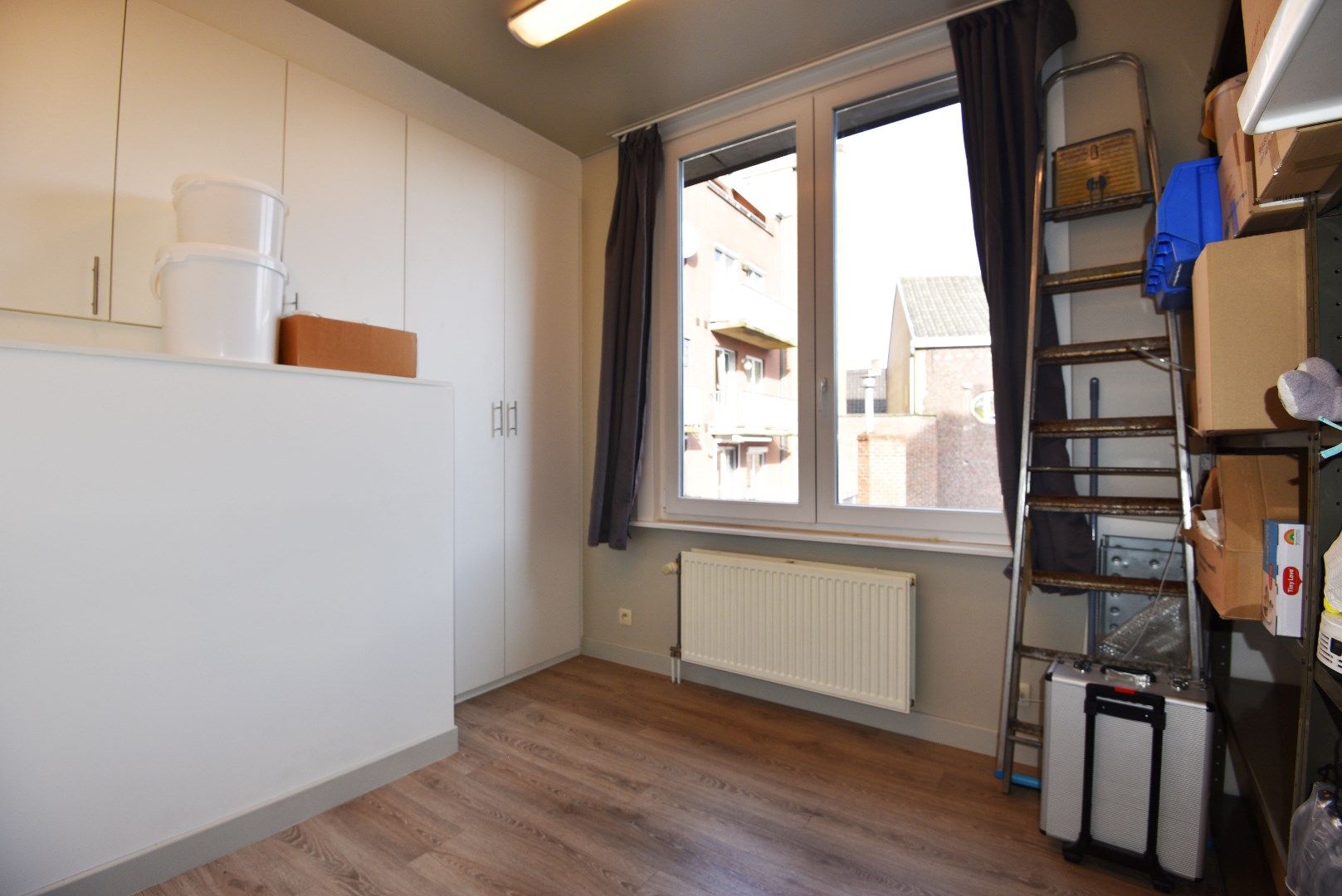 Gerenoveerd handelspand met duplexappartement te centrum Eeklo foto 10