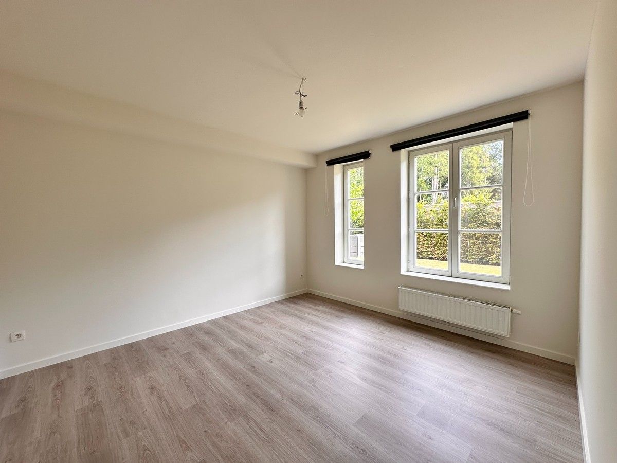 Mooi gelijkvloersappartement met 2 slpk en parking foto 12