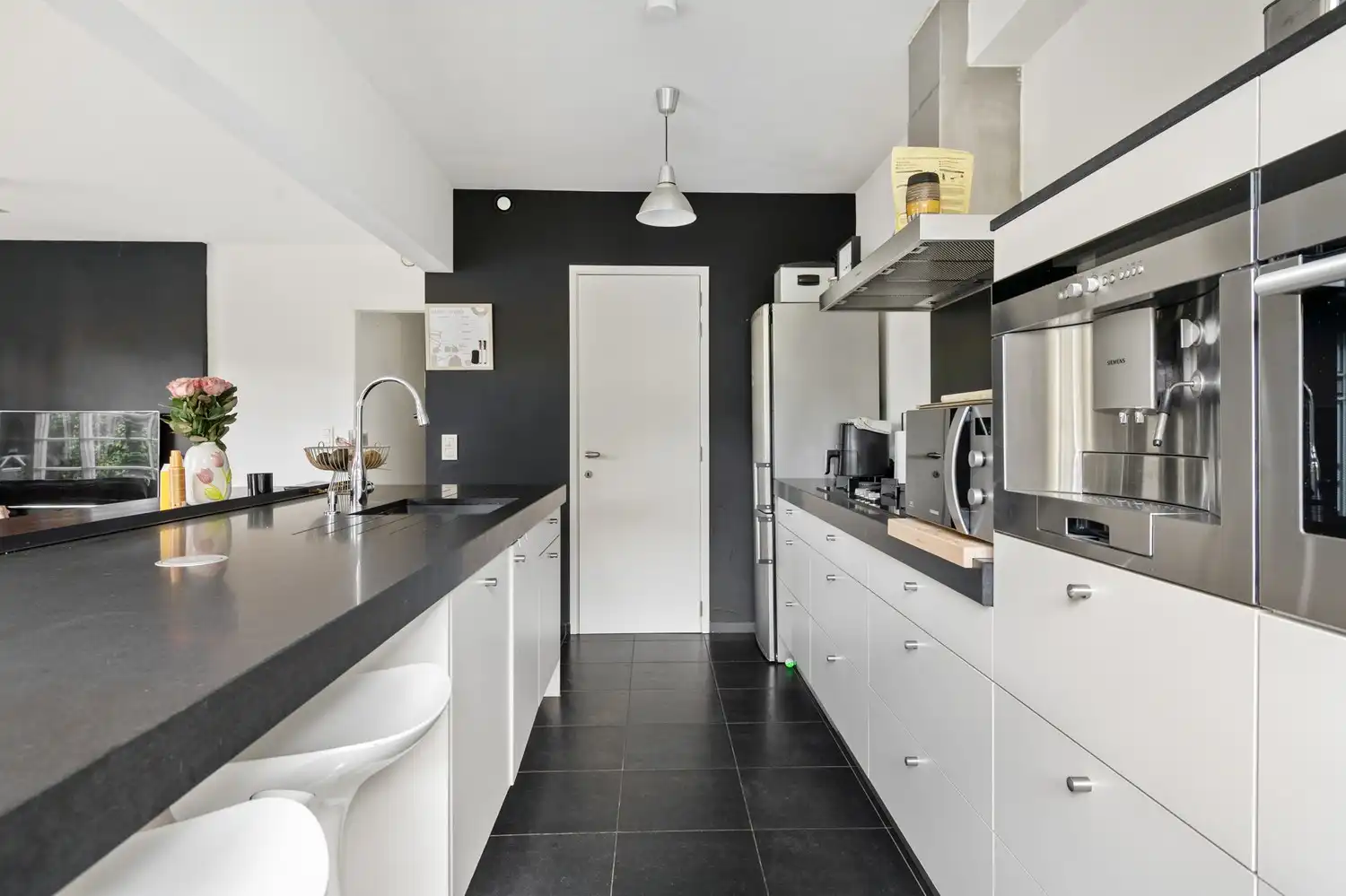 Instapklaar gelijkvloers één-slaapkamer appartement met staanplaats te Boechout foto 9
