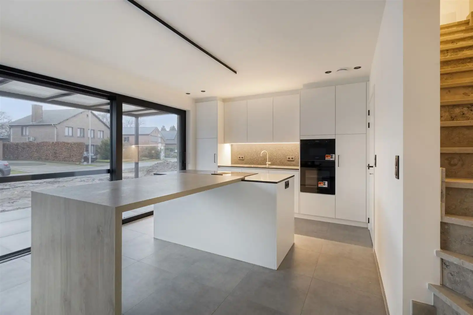 TE HUUR: Ruime nieuwbouwwoning met 3 slaapkamers te Pelt! foto 7